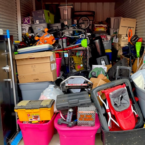 Messy Household Contents and Boxes Inside a Storage Unit